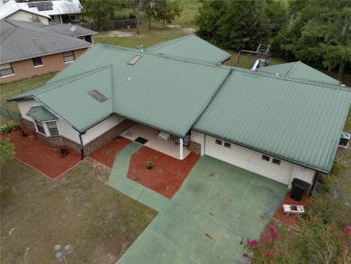 Welcome to this lovely, well-maintained 3-bedroom, 2-bath home on Williston Highlands Golf and Country Club in Florida - for sale on GolfHomes.com, golf home, golf lot