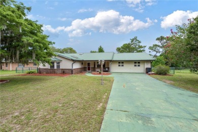 Welcome to this lovely, well-maintained 3-bedroom, 2-bath home on Williston Highlands Golf and Country Club in Florida - for sale on GolfHomes.com, golf home, golf lot