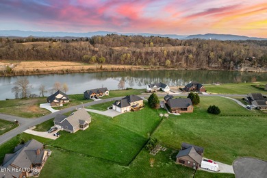 Best of Location!! Welcome home and enjoy Amazing French Broad on River Islands Golf Club in Tennessee - for sale on GolfHomes.com, golf home, golf lot