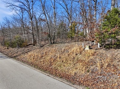 Exceptional vacant lot with beautiful direct water views located on The Club At Porto Cima in Missouri - for sale on GolfHomes.com, golf home, golf lot