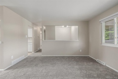 Unique remodeled home in Virginia Court at the top of a quiet on Aurora Hills Golf Course in Colorado - for sale on GolfHomes.com, golf home, golf lot