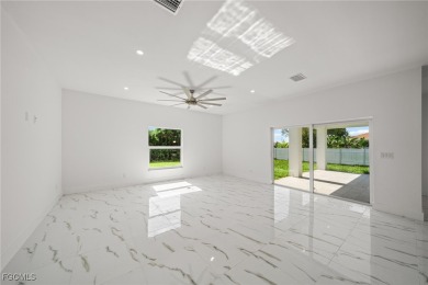 Stunning brand new modern home offering 3 bedrooms plus a on Del Tura Golf and Country Club in Florida - for sale on GolfHomes.com, golf home, golf lot