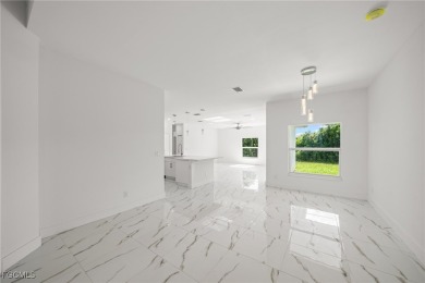 Stunning brand new modern home offering 3 bedrooms plus a on Del Tura Golf and Country Club in Florida - for sale on GolfHomes.com, golf home, golf lot
