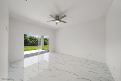 Stunning brand new modern home offering 3 bedrooms plus a on Del Tura Golf and Country Club in Florida - for sale on GolfHomes.com, golf home, golf lot