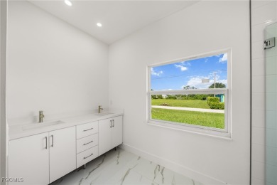 Stunning brand new modern home offering 3 bedrooms plus a on Del Tura Golf and Country Club in Florida - for sale on GolfHomes.com, golf home, golf lot