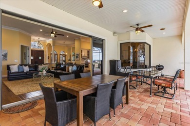 Set along approximately 82 feet of shimmering Lake Dora on Deer Island Country Club in Florida - for sale on GolfHomes.com, golf home, golf lot