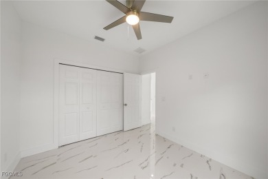 Stunning brand new modern home offering 3 bedrooms plus a on Del Tura Golf and Country Club in Florida - for sale on GolfHomes.com, golf home, golf lot