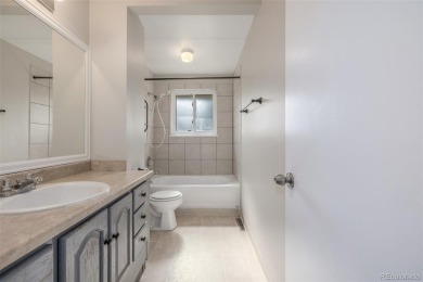 Unique remodeled home in Virginia Court at the top of a quiet on Aurora Hills Golf Course in Colorado - for sale on GolfHomes.com, golf home, golf lot