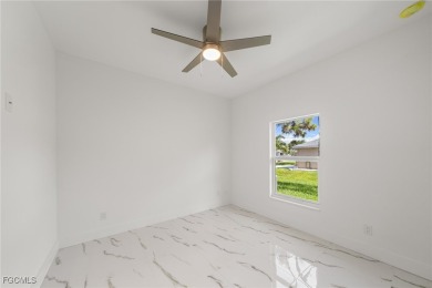 Stunning brand new modern home offering 3 bedrooms plus a on Del Tura Golf and Country Club in Florida - for sale on GolfHomes.com, golf home, golf lot