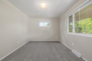 Unique remodeled home in Virginia Court at the top of a quiet on Aurora Hills Golf Course in Colorado - for sale on GolfHomes.com, golf home, golf lot
