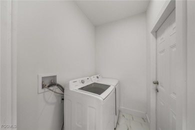 Stunning brand new modern home offering 3 bedrooms plus a on Del Tura Golf and Country Club in Florida - for sale on GolfHomes.com, golf home, golf lot