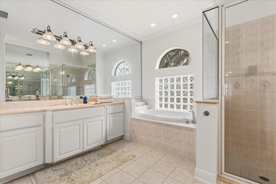 Set along approximately 82 feet of shimmering Lake Dora on Deer Island Country Club in Florida - for sale on GolfHomes.com, golf home, golf lot