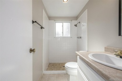 Unique remodeled home in Virginia Court at the top of a quiet on Aurora Hills Golf Course in Colorado - for sale on GolfHomes.com, golf home, golf lot