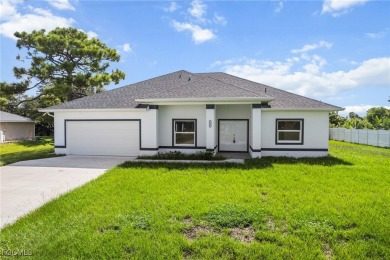 Stunning brand new modern home offering 3 bedrooms plus a on Del Tura Golf and Country Club in Florida - for sale on GolfHomes.com, golf home, golf lot