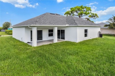 Stunning brand new modern home offering 3 bedrooms plus a on Del Tura Golf and Country Club in Florida - for sale on GolfHomes.com, golf home, golf lot