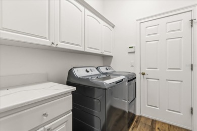 Set along approximately 82 feet of shimmering Lake Dora on Deer Island Country Club in Florida - for sale on GolfHomes.com, golf home, golf lot