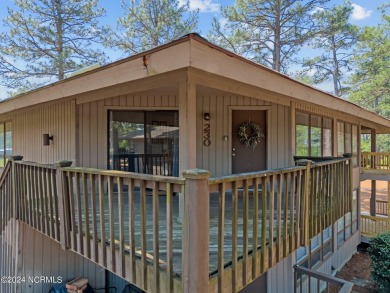 Golf front 2-bedroom condo located in Foxfire overlooking the on Foxfire Golf and Country Club in North Carolina - for sale on GolfHomes.com, golf home, golf lot