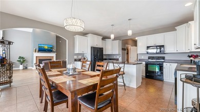 Lake Views in Every Direction - Welcome to Bello Point! Wake up on The Club At Porto Cima in Missouri - for sale on GolfHomes.com, golf home, golf lot