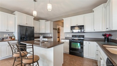 Lake Views in Every Direction - Welcome to Bello Point! Wake up on The Club At Porto Cima in Missouri - for sale on GolfHomes.com, golf home, golf lot