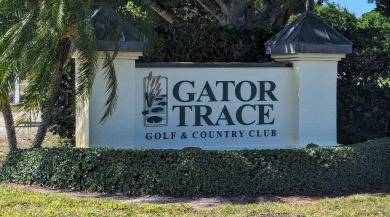 WELL KEPT DUPLEX WITH BRAND NEW ROOF LOCATED ON BEAUTIFUL HALF on Gator Trace Golf and Country Club in Florida - for sale on GolfHomes.com, golf home, golf lot