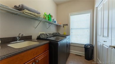 Lake Views in Every Direction - Welcome to Bello Point! Wake up on The Club At Porto Cima in Missouri - for sale on GolfHomes.com, golf home, golf lot