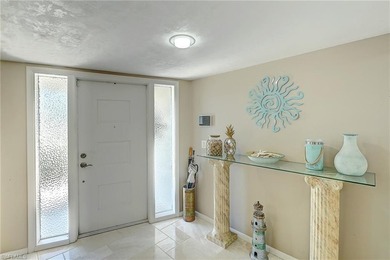 Step into this stunning, COMPLETELY REMODELED residence nestled on Whiskey Creek Country Club in Florida - for sale on GolfHomes.com, golf home, golf lot