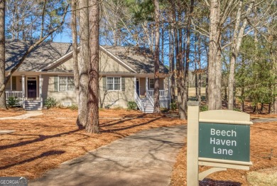 Sought after gated community at Reynolds-Lake Oconee with golf on Great Waters Course At Reynolds Plantation in Georgia - for sale on GolfHomes.com, golf home, golf lot