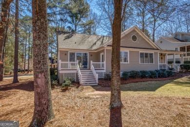 Sought after gated community at Reynolds-Lake Oconee with golf on Great Waters Course At Reynolds Plantation in Georgia - for sale on GolfHomes.com, golf home, golf lot