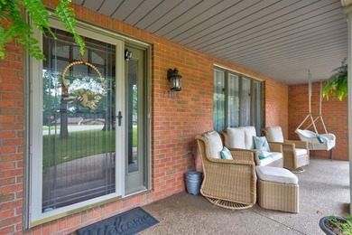 All brick ranch home with basement on a corner lot in walking on Christmas Lake Golf Course in Indiana - for sale on GolfHomes.com, golf home, golf lot