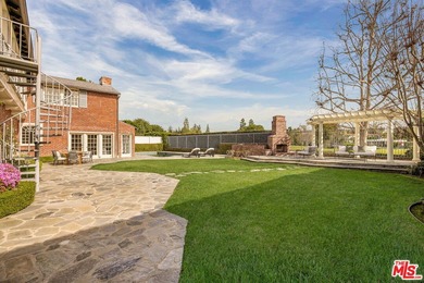 Set on Hancock Park's most coveted street, this grand Colonial on Wilshire Country Club in California - for sale on GolfHomes.com, golf home, golf lot