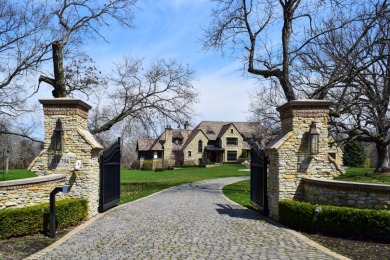 As you enter the gates to this sprawling property in the lovely on Royal Fox Country Club in Illinois - for sale on GolfHomes.com, golf home, golf lot