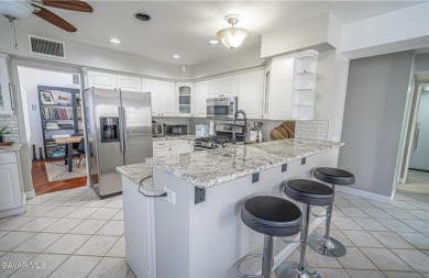 Prepare to be captivated by this charming two-story gem nestled on Rancho Vista Golf Course in California - for sale on GolfHomes.com, golf home, golf lot