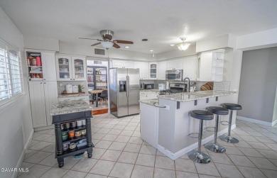 Prepare to be captivated by this charming two-story gem nestled on Rancho Vista Golf Course in California - for sale on GolfHomes.com, golf home, golf lot