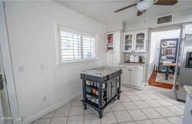Prepare to be captivated by this charming two-story gem nestled on Rancho Vista Golf Course in California - for sale on GolfHomes.com, golf home, golf lot