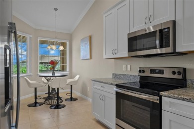 Experience refined living in this elegant second-floor residence on Esplanade Golf and Country at Lakewood Ranch in Florida - for sale on GolfHomes.com, golf home, golf lot