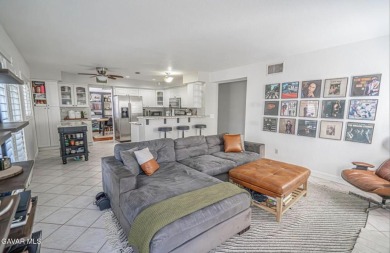 Prepare to be captivated by this charming two-story gem nestled on Rancho Vista Golf Course in California - for sale on GolfHomes.com, golf home, golf lot