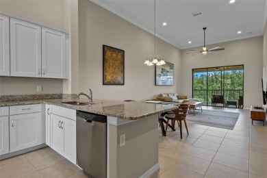 Experience refined living in this elegant second-floor residence on Esplanade Golf and Country at Lakewood Ranch in Florida - for sale on GolfHomes.com, golf home, golf lot