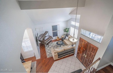 Prepare to be captivated by this charming two-story gem nestled on Rancho Vista Golf Course in California - for sale on GolfHomes.com, golf home, golf lot