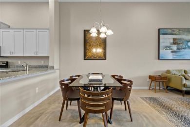 Experience refined living in this elegant second-floor residence on Esplanade Golf and Country at Lakewood Ranch in Florida - for sale on GolfHomes.com, golf home, golf lot