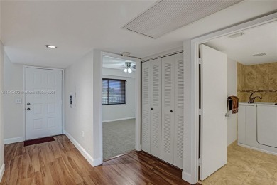This substantially remodeled 2 bedroom with 2 baths is located on Flamingo Lakes Country Club in Florida - for sale on GolfHomes.com, golf home, golf lot