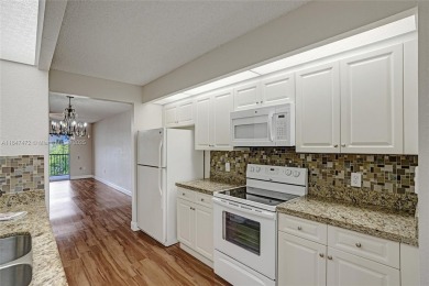 This substantially remodeled 2 bedroom with 2 baths is located on Flamingo Lakes Country Club in Florida - for sale on GolfHomes.com, golf home, golf lot