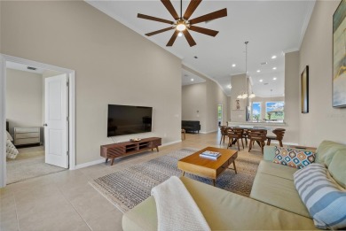 Experience refined living in this elegant second-floor residence on Esplanade Golf and Country at Lakewood Ranch in Florida - for sale on GolfHomes.com, golf home, golf lot