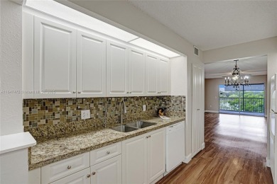 This substantially remodeled 2 bedroom with 2 baths is located on Flamingo Lakes Country Club in Florida - for sale on GolfHomes.com, golf home, golf lot