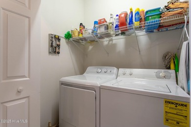 This stylishly renovated 2-bedroom home features a host of on Sound Golf Links at Albemarle Plantation in North Carolina - for sale on GolfHomes.com, golf home, golf lot