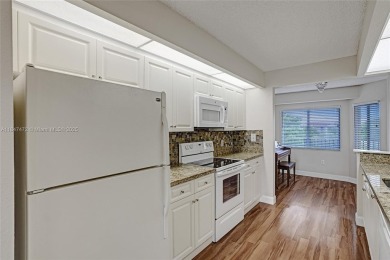 This substantially remodeled 2 bedroom with 2 baths is located on Flamingo Lakes Country Club in Florida - for sale on GolfHomes.com, golf home, golf lot