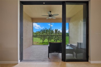 Experience refined living in this elegant second-floor residence on Esplanade Golf and Country at Lakewood Ranch in Florida - for sale on GolfHomes.com, golf home, golf lot