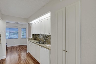 This substantially remodeled 2 bedroom with 2 baths is located on Flamingo Lakes Country Club in Florida - for sale on GolfHomes.com, golf home, golf lot