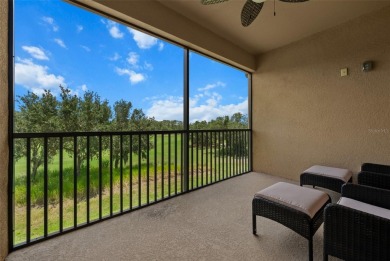 Experience refined living in this elegant second-floor residence on Esplanade Golf and Country at Lakewood Ranch in Florida - for sale on GolfHomes.com, golf home, golf lot