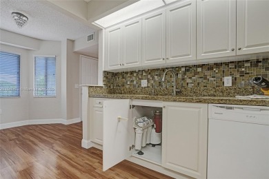 This substantially remodeled 2 bedroom with 2 baths is located on Flamingo Lakes Country Club in Florida - for sale on GolfHomes.com, golf home, golf lot