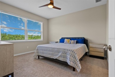 Experience refined living in this elegant second-floor residence on Esplanade Golf and Country at Lakewood Ranch in Florida - for sale on GolfHomes.com, golf home, golf lot